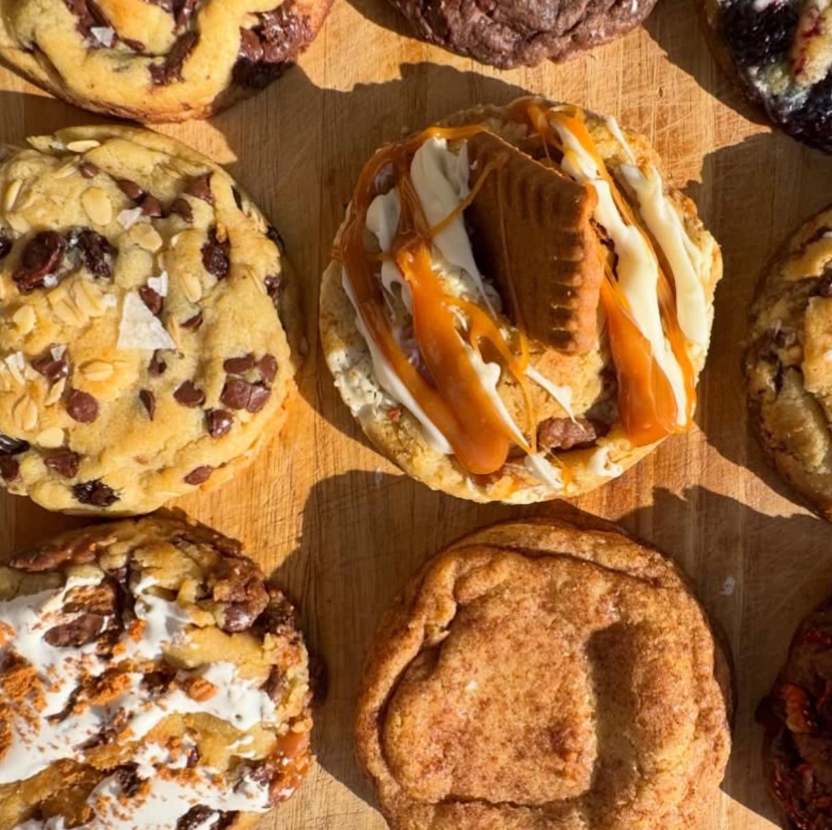 Assorted decorated sugar cookies on a tray